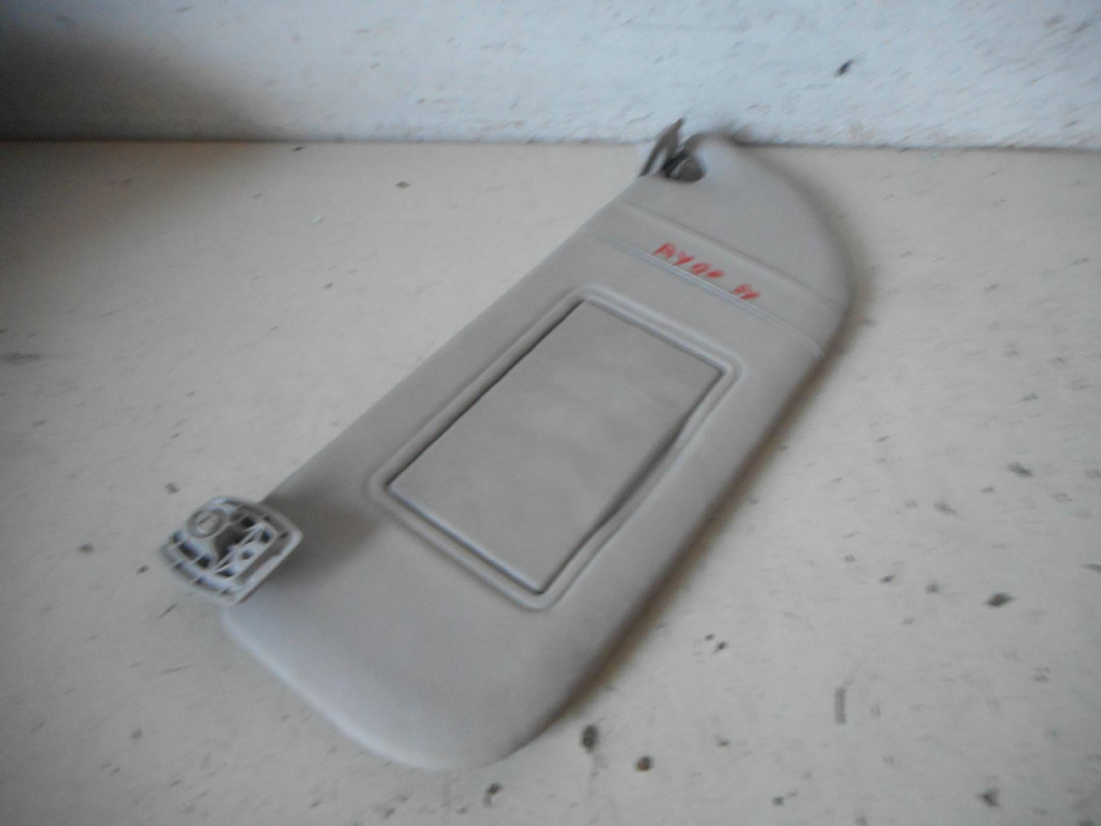 Aletta parasole parabrezza sx.